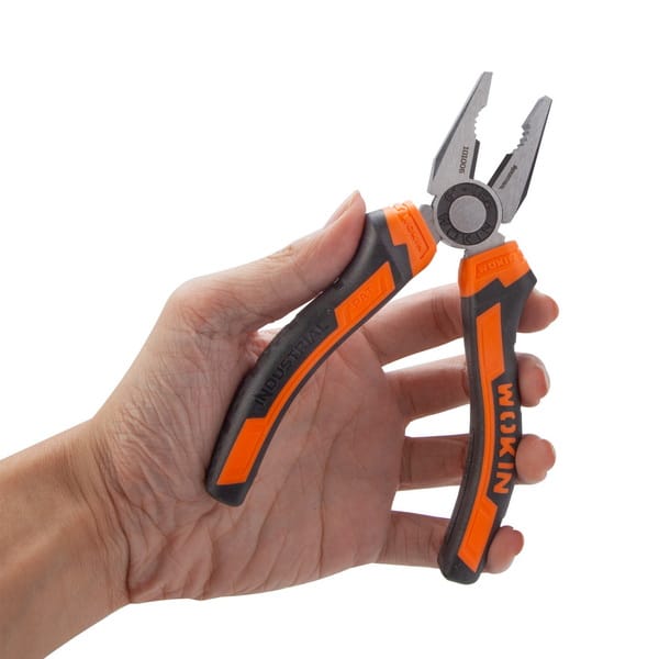 A hand holding WOKIN 6 inch combination pliers to demonstrate size and comfortable grip in use.