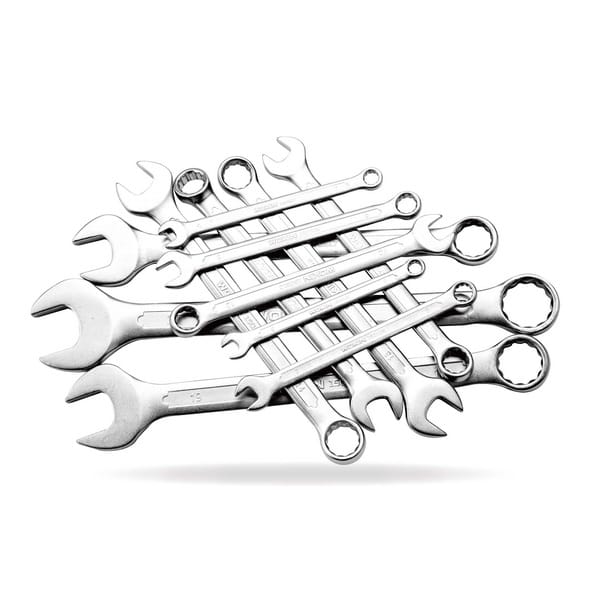 Full collection of the WOKIN 12pcs combination spanner set scattered to display the polished chrome finish, open ends, and ring ends.