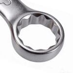 Close-up detail of the 12-point box end (ring end) of a WOKIN combination spanner designed for secure gripping.