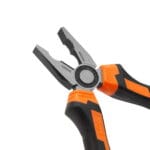Close-up detail of the serrated jaws and wire cutting edge on WOKIN combination pliers.