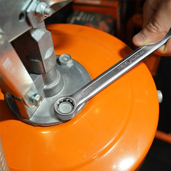 Using a combination spanner from the Wokin 98pcs tool chest set on a bolt