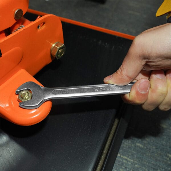 Using a combination spanner from the Wokin 98pcs tool chest set on a bolt and nut