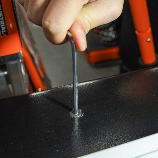 Using a hex key from the Wokin 98pcs tool chest set to tighten a screw