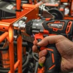 Close-up of Using Wokin 20V Li-ion Brushless Cordless Impact Wrench on a lug nut