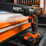 Wokin 20V Li-ion Brushless Cordless Impact Wrench on workshop shelf
