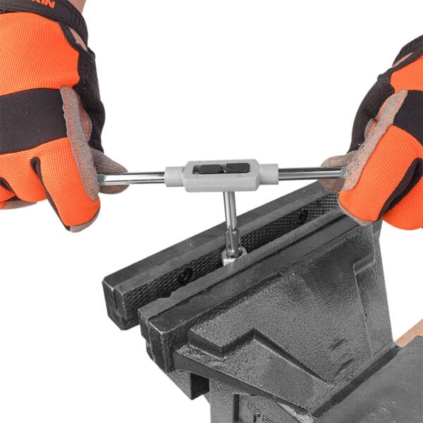 Close-up of Wokin tap and wrench from 8pcs set being used for tapping