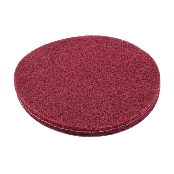 Front view of the WOKIN maroon non-woven abrasive disc designed for elastic grinding, polishing, and surface preparation.