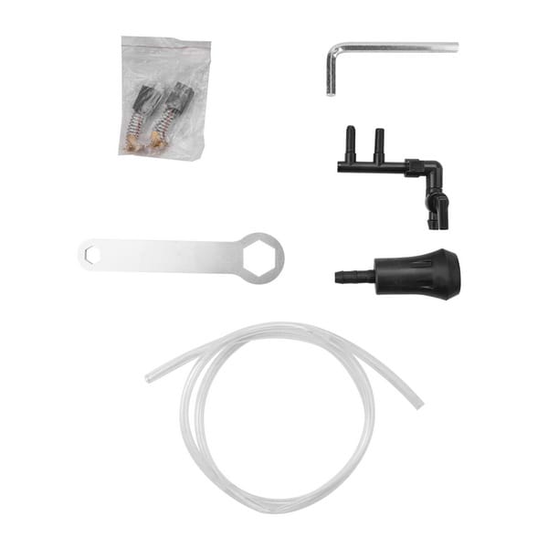 Accessory set for WOKIN 12A Marble Cutter including hex key, plastic connectors, wrench, nozzle, and coiled tube