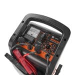 Control panel of WOKIN battery charger featuring an analog ammeter, 60-minute timer, fuse access, and switches for 12V/24V selection and boost mode.