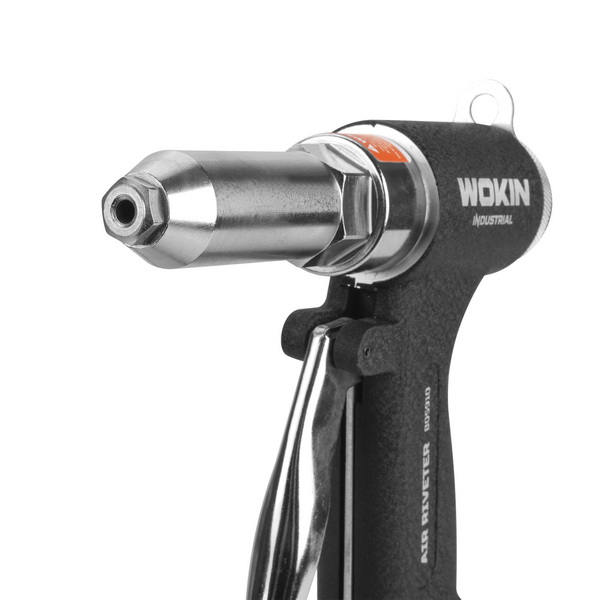 Close-up view of the silver nosepiece and interchangeable rivet nozzle on the WOKIN air riveter, designed for precision setting of blind rivets.