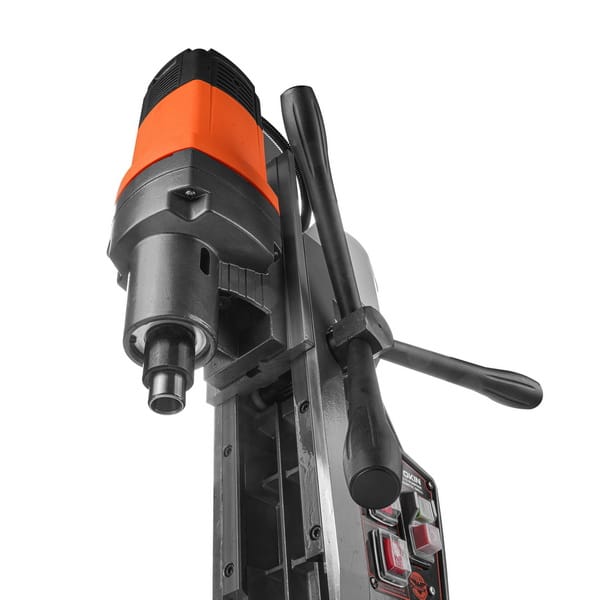 Close-up detail of the powerful motor head and spindle interface on the WOKIN industrial magnetic drill.