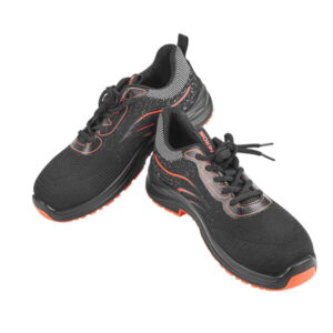 A pair of WOKIN lightweight athletic-style safety sneakers, featuring a breathable black knit upper with dynamic orange accents and secure laces.